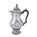 A silver ogee baluster hotwater pot by Crichton Bros, London 1916   A silver ogee baluster