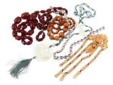 A small collection of bead necklaces and other items , comprising   A small collection of bead