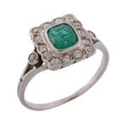 An early 20th century diamond and emerald cluster ring , circa 1910   An early 20th century