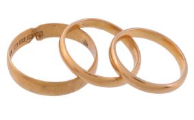A 22 carat gold ring, the band of plain polished form   A 22 carat gold ring,   the band of plain