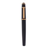 Cartier, Diabolo de Cartier, a black fountain pen, with a black cap and barrel   Cartier, Diabolo de