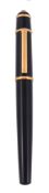 Cartier, Diabolo de Cartier, a black fountain pen, with a black cap and barrel   Cartier, Diabolo de