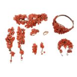 A coral brooch and side panels, the coral in the form of twisting clusters...   A coral brooch and