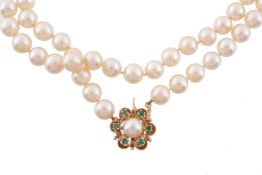 An opera length single row cultured pearl necklace   An opera length single row cultured pearl