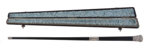 A Victorian silver mounted ebonised conductor's baton by Henry Pope   A Victorian silver mounted
