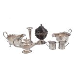 A collection of silver, including: a table lighter in the form of a wick lamp   A collection of