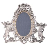 A late Victorian silver mounted small photograph frame by William Comyns   A late Victorian silver