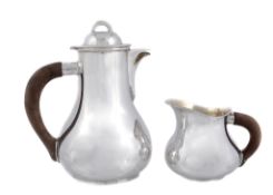 An Italian silver coloured baluster coffee jug and cream jug by Gabrielle De...   An Italian