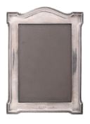 A silver mounted small photograph frame by Lionel Smith  &  Co   A silver mounted small photograph