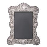 An Edwardian silver mounted photograph frame by J.  &  R   An Edwardian silver mounted photograph