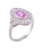 A pink sapphire and diamond cluster ring, the central oval cut pink sapphire...   A pink sapphire