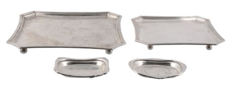 Two graduated Austro-Hungarian silver shaped square salvers, Pest 1872-1922,   Two graduated