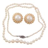 A pair of mabe pearl earrings, the central mabe pearl within a scalloped...   A pair of mabe pearl