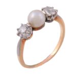 A pearl and diamond ring, the central pearl set between two old brilliant...   A pearl and diamond