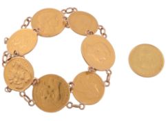 A gold coloured coin bracelet, composed of various gold coins   A gold coloured coin bracelet,