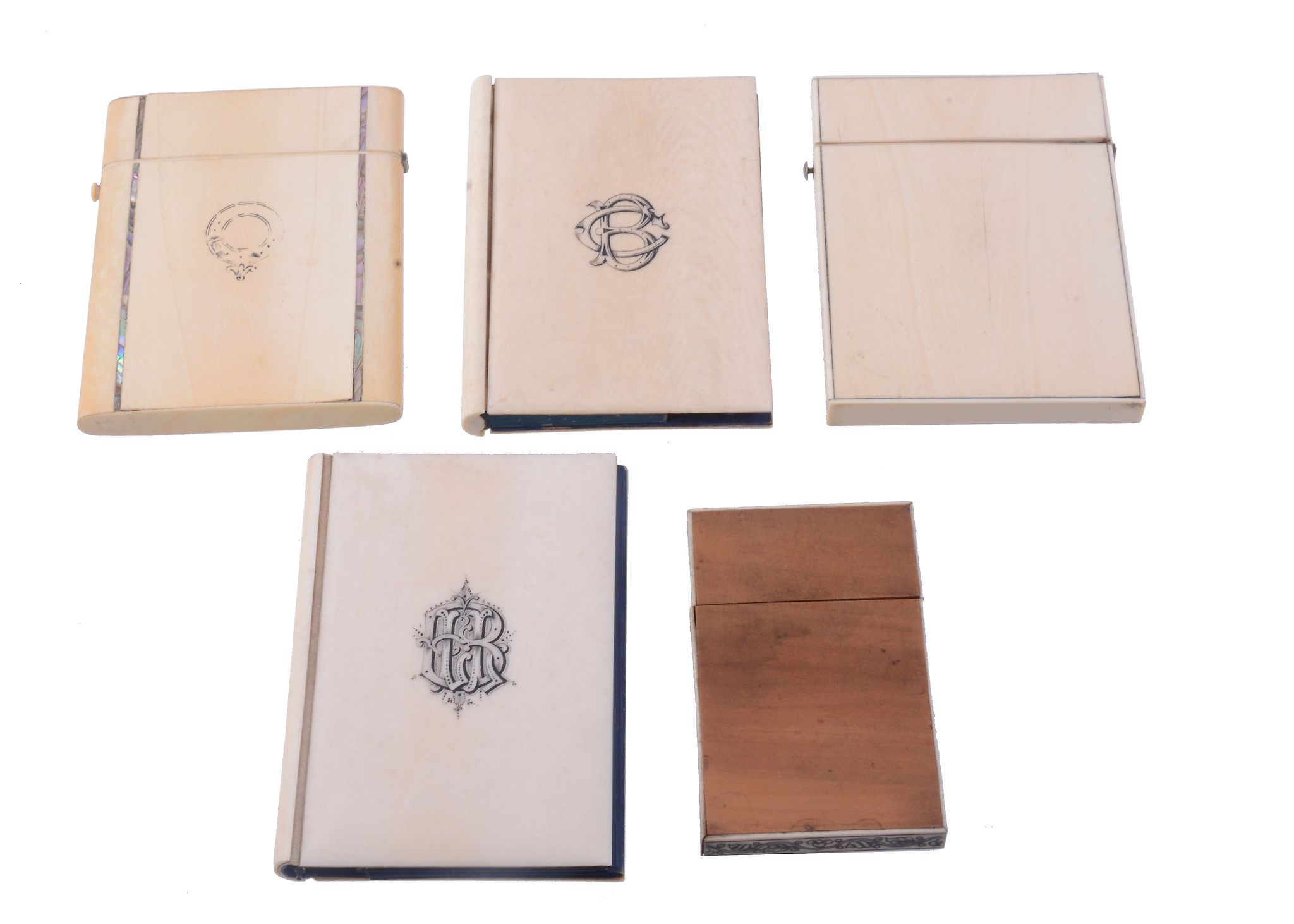 Five Victorian card cases, comprising: an ivory example   Five Victorian card cases,   comprising: