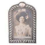 A late Victorian silver mounted photograph frame, maker's mark illegible   A late Victorian silver