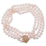 A two strand cultured pearl necklace, composed of uniform cultured pearls   A two strand cultured