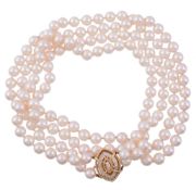A two strand cultured pearl necklace, composed of uniform cultured pearls   A two strand cultured