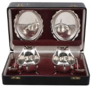 A cased pair of silver shaped oval sauce boats   A cased pair of silver shaped oval sauce boats,