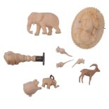 A small collection of ivory items, to include   A small collection of ivory items,   to include: a