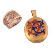 A Victorian gold locket, circa 1890, the locket with red and blue enamelled...   A Victorian gold