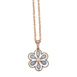 An early 20th century aquamarine and half pearl flower head pendant   An early 20th century