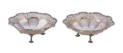 A pair of silver gilt nonofoil baskets by James Dixon  &  Sons, Sheffield 1912-13   A pair of silver