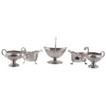 A collection of silver, to include: an Edwardian silver navette shaped sugar...   A collection of