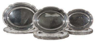 A graduated set of fifteen electroplated shaped oval serving plates by...   A graduated set of