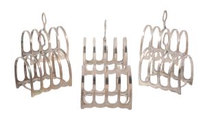 A set of six silver five bar toastracks by Harrison Brothers  &  Howson   A set of six silver five