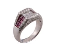 A ruby and diamond ring, the panel set with square cut diamonds between...   A ruby and diamond