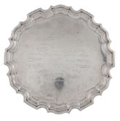 A silver shaped circular salver by Walker  &  Hall, Sheffield 1951   A silver shaped circular salver