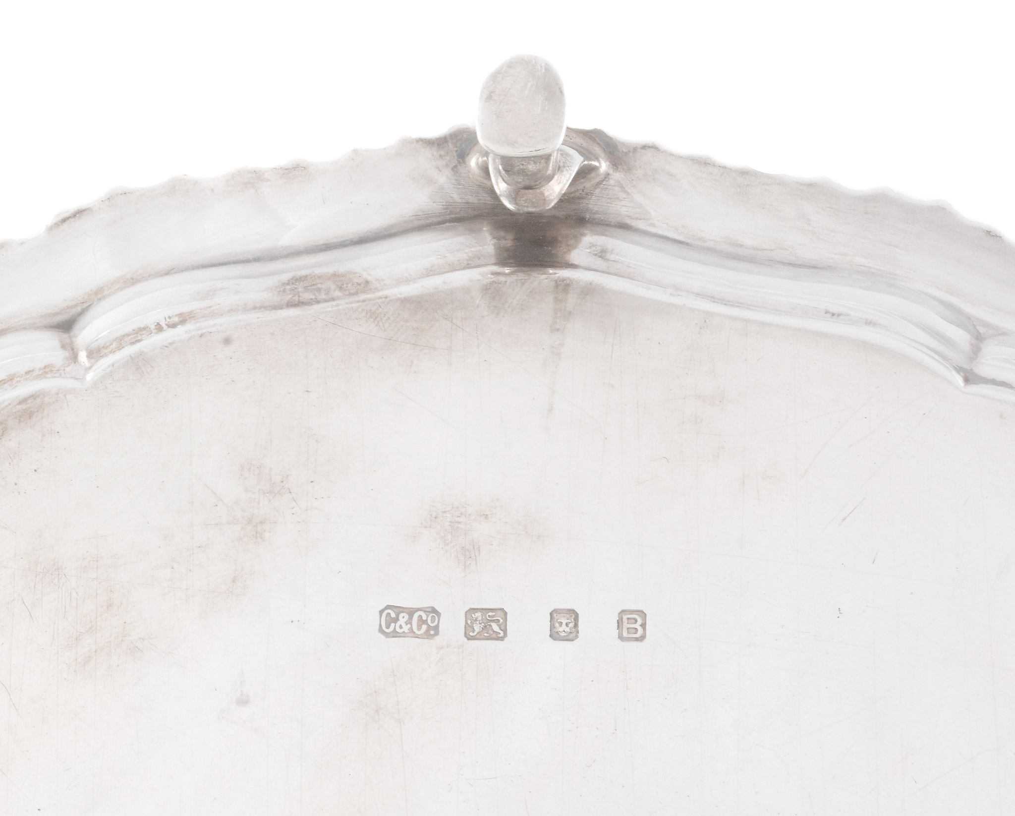 A silver shaped circular salver by Carrington  &  Co   A silver shaped circular salver by Carrington - Image 2 of 2