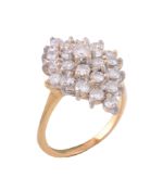 An 18 carat gold diamond ring, the marquise shaped panel set with brilliant...   An 18 carat gold