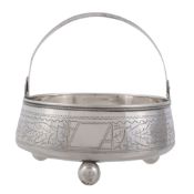 A Russian silver circular swing handled sugar basin, maker's mark NL , Tula   A Russian silver