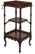A mahogany three-tier whatnot in George III Chippendale style, 19th century   A mahogany three-