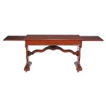 A Victorian mahogany library table , circa 1850, fitted a slide to each end   A Victorian mahogany