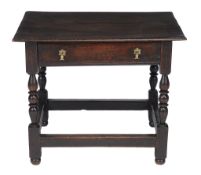 An oak side table , circa 1660 and later, with single drawer, 67cm high   An oak side table  , circa