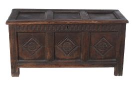 A Charles II oak panelled coffer with carved front , circa 1660   A Charles II oak panelled coffer