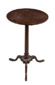 A GeorgeII mahogany tripod table, circa 1750, 70cm high, the top 46cm diameter   A GeorgeII mahogany