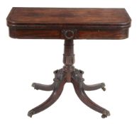 A late Regency mahogany folding card table , circa 1820   A late Regency mahogany folding card table