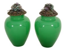 A pair of Chinese green glass ovoid vases, 20th century A pair of Chinese green glass ovoid vases,