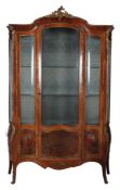 A French kingwood and gilt metal mounted vitrine, last quarter 19th century   A French kingwood