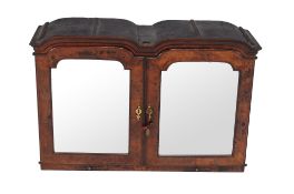 A Queen Anne double dome cabinet , circa 1710, in the manner of John Belchier A Queen Anne double
