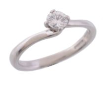 A platinum and diamond ring, set with a brilliant cut diamond   A platinum and diamond ring,   set