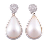 A pair of diamond and mabe pearl ear pendents   A pair of diamond and mabe pearl ear pendents  , the