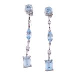 A pair of aquamarine and diamond ear pendents, set with a circular cut   A pair of aquamarine and