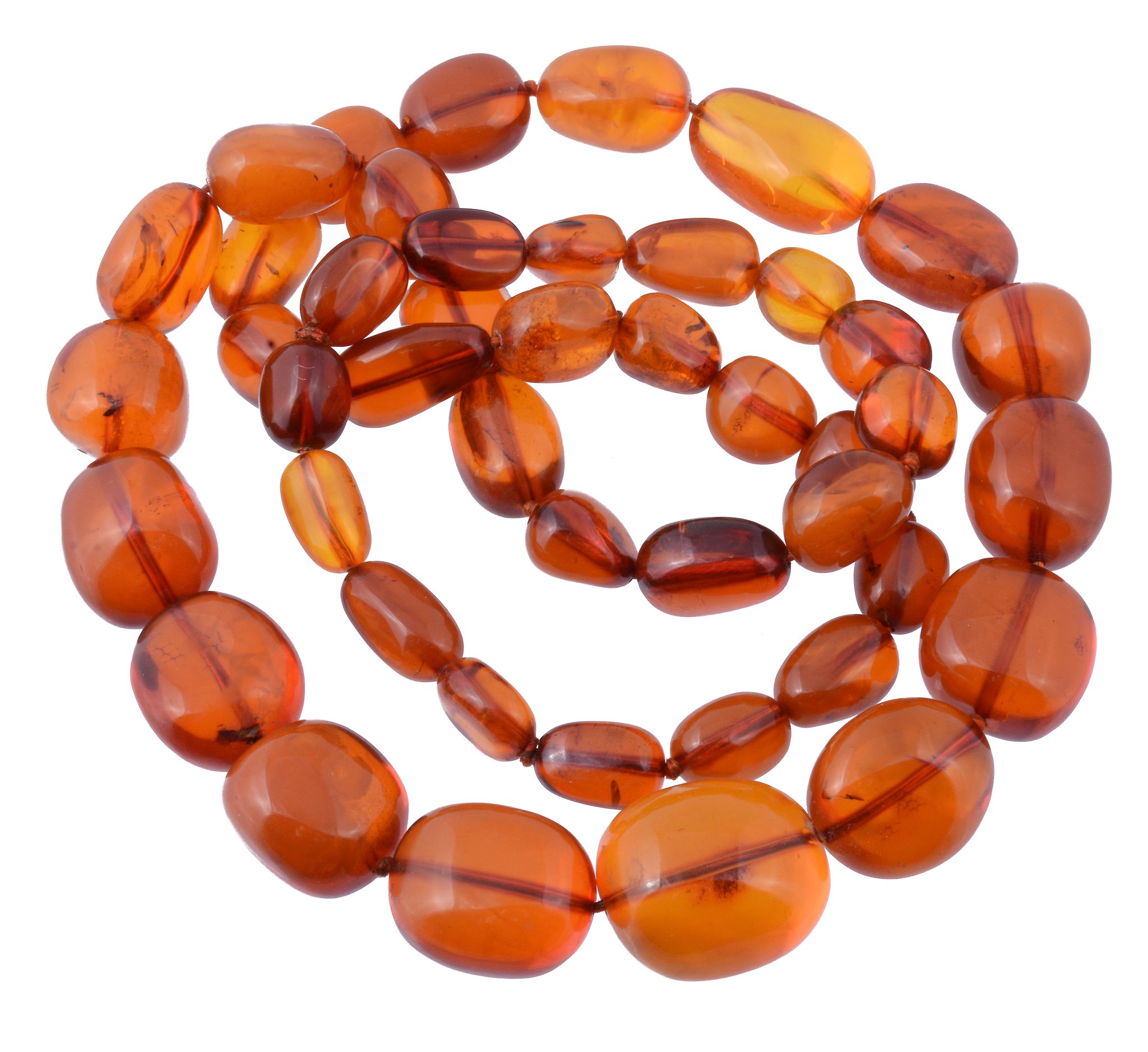 An amber bead necklace, the forty five graduated polished beads measuring...   An amber bead