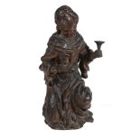 A central European sculpted and stained wood model of a female saint   A central European sculpted